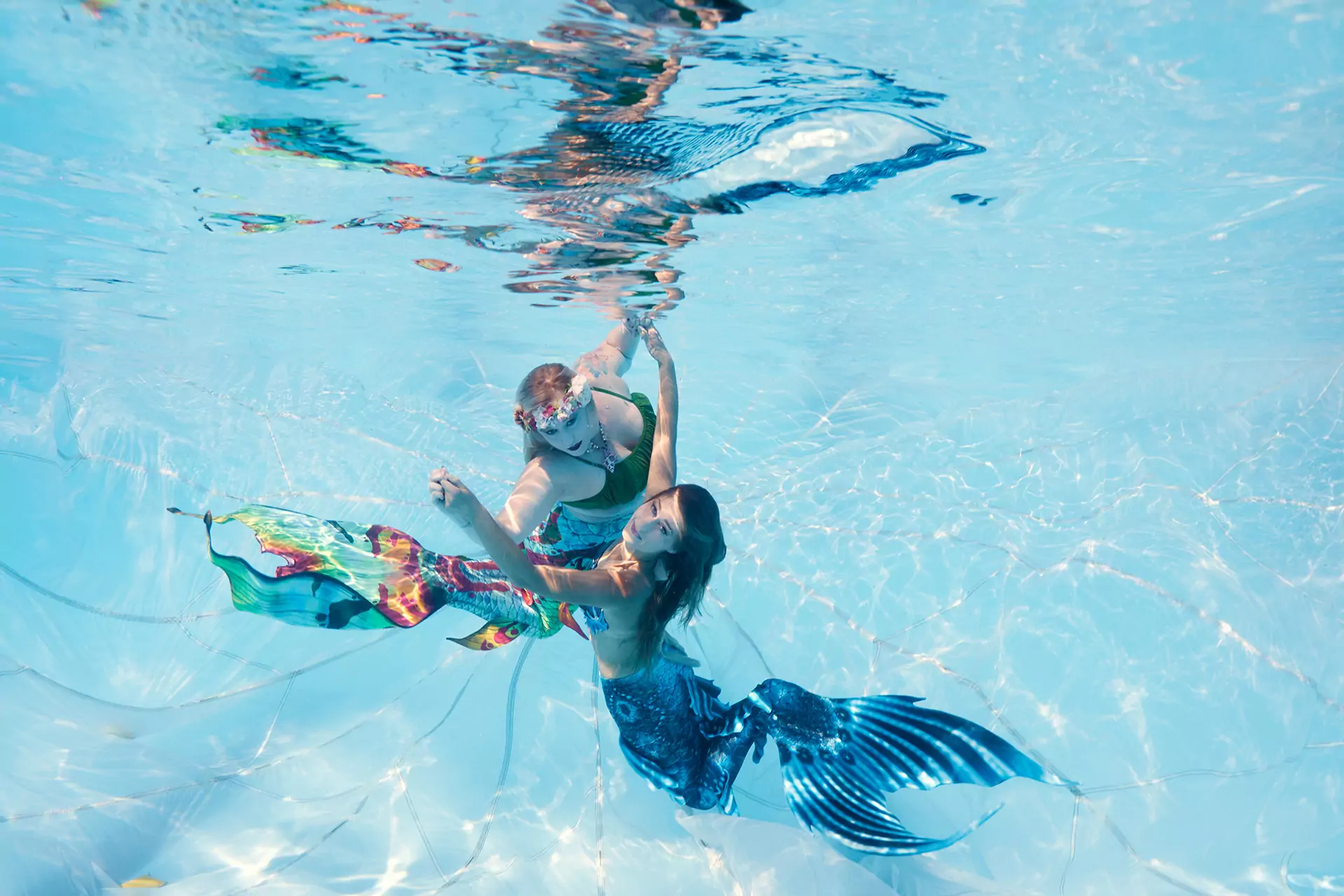 Tanzende Meerjungfrauen Unterwasser